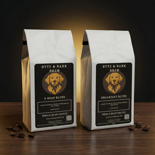 Two coffee bags labeled 'Byte & Bark Brew' on a wooden surface with a dark background.