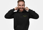 Man wearing a black hoodie with Byte & Bark Brew on the front