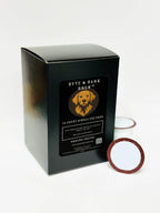 Black coffee pod box with a dog logo and text on a white background