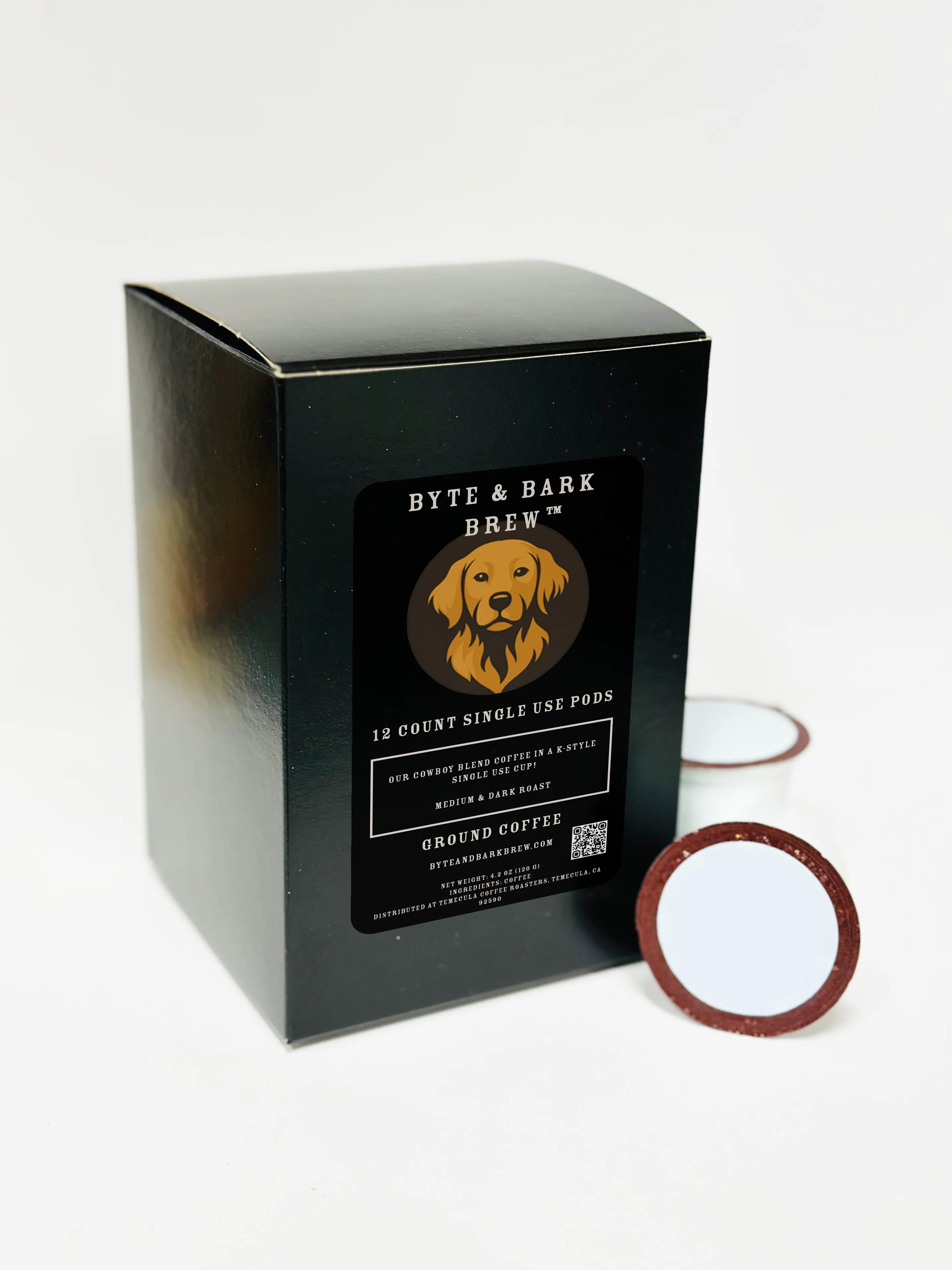 Black coffee pod box with a dog logo and text on a white background