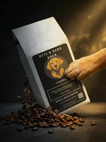 Byte & Bark Brew coffee bag with a dog paw touching it, surrounded by coffee beans on a dark background.