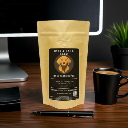 Bag of Byte & Bark Brew Mushroom Coffee Dark Roast on a computer workstation — fueling focus and productivity for coffee-loving dog owners.