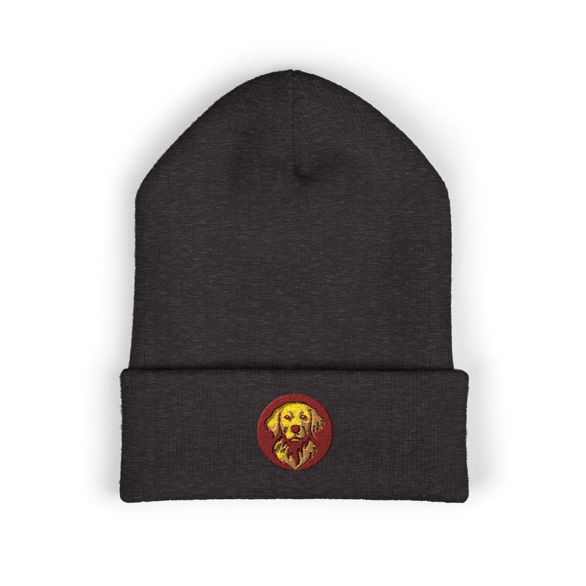 Dark charcoal knit beanie with folded cuff featuring small round embroidered golden retriever patch